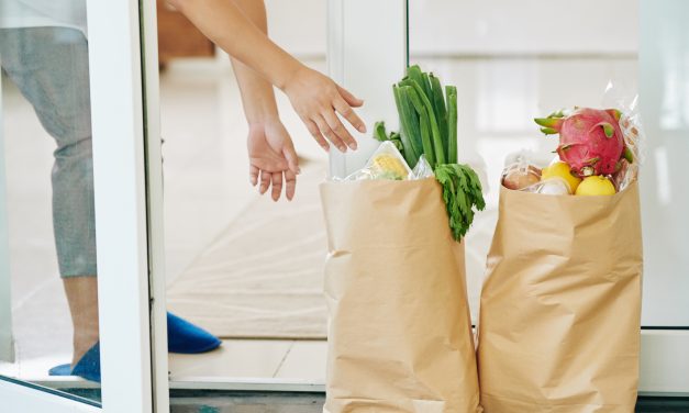 Sanitizing groceries at checkout with UV light